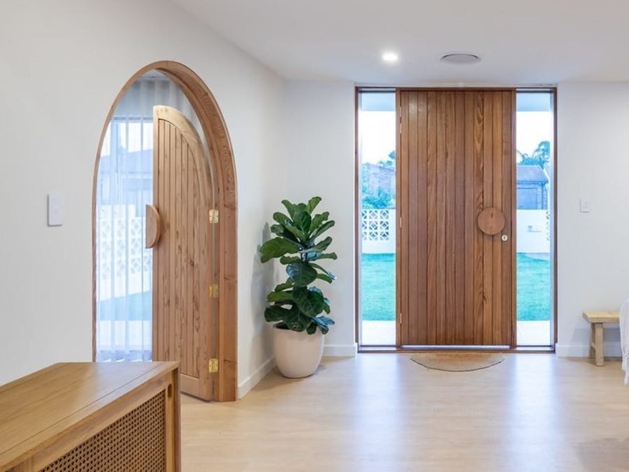 Arched and straight timber entrance doors